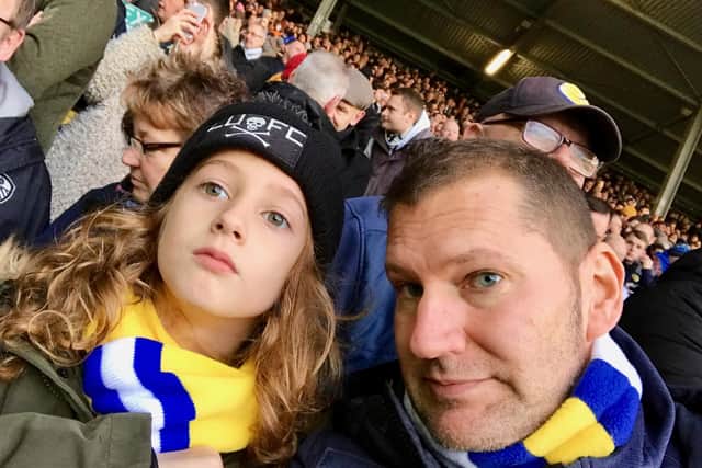 Leeds United author Raiford Guins (R) and his son Deckard at Elland Road in 2018