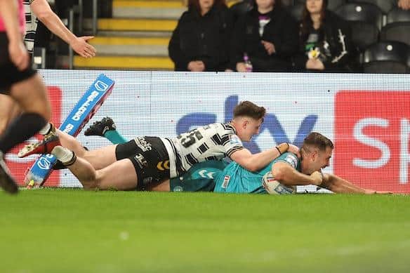 Iain Thornley scores for Wigan at Hull FC in May. Picture by John Clifton/SWpix.com.