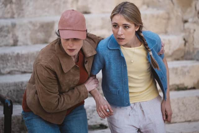 Kate (Gemma Arterton) rushed to protect her asset Lena (Alma Prelec) while on an operation in Malta in the new ITV thriller Secret Service (Picture: Potboiler Productions/ITV)