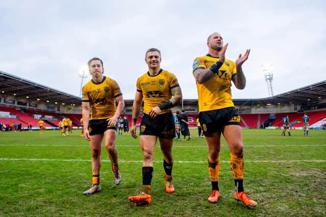 Castleford Tigers' Thomas Weaver, Brock Greacen and Joe Westerman celebrate last week's Betfred Challenge Cup win at Doncaster. Picture by Allan McKenzie/SWpix.com.