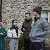 Fred Kettle on set at Emmerdale with his co-stars. Photo: ITV