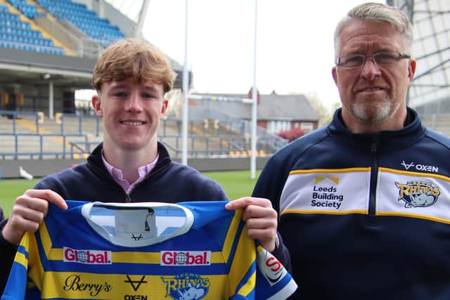 Former England under-18s rugby union back Ned McCormack, pictured with Rhinos' head of player pathways John Bastian, is set to make his Leeds debut against Bradford. Picture by Phil Daly/Leeds Rhinos