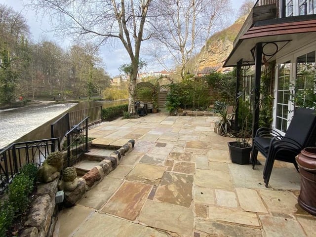 A large patio with lovely views across the River Nidd.