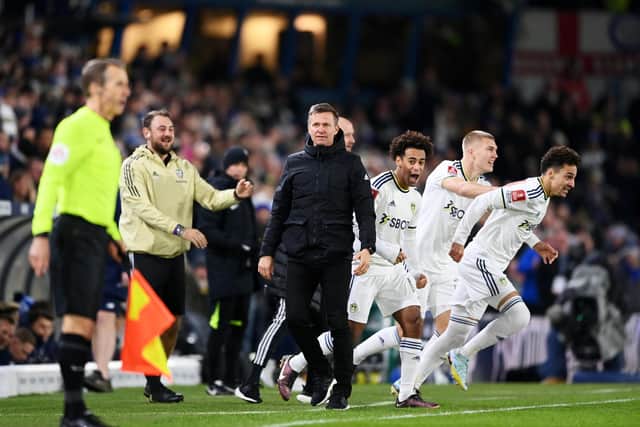 LEEDS, ENGLAND - JANUARY 18: Jesse Marsch, Manager of Leeds United, looks on as players of Leeds United celebrate after Wilfried Gnonto (not pictured) scores the team's first goal during the Emirates FA Cup Third Round Replay match between Leeds United and Cardiff City at Elland Road on January 18, 2023 in Leeds, England. (Photo by Michael Regan/Getty Images)