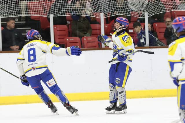 ON THE UP: Jonas Bennett (right) and centre Edgars Vengis celebrate a goal while playing for Leeds Junior Knights last season. Picture: