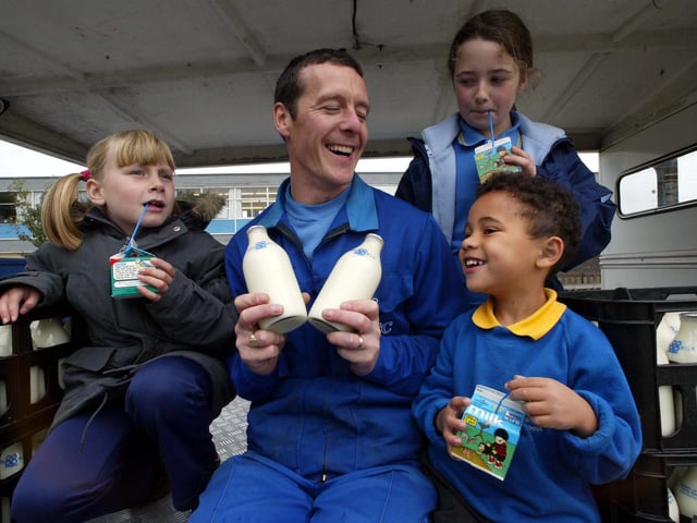 Pupils from Hugh Gaitskill School were supplied free milk as part of National School Milk Week in October 2002. Pictured, from left, are Charlotte Mear, Yasmin Rhodes and Wesley McGough alongside milkman Stephen Greenwood.