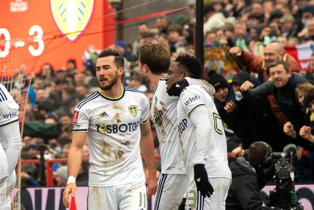 Jack Harrison and team mates celebrate after Leeds United score their third goal.
.Accrington Stanley v Leeds United.  FA Cup 4th round. Wham Stadium.
28 January 2023.  Picture Bruce Rollinson