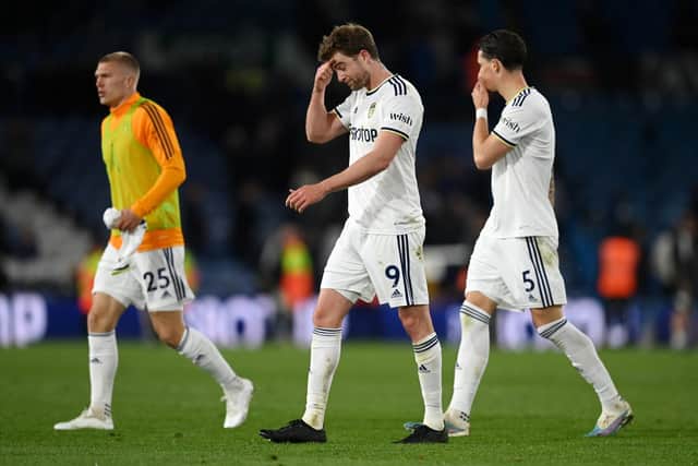 CHANCE GONE: As Leeds United trio Patrick Bamford, centre, Robin Koch, right, and substitute Rasmus Kristensen, left, depart following Tuesday night's 1-1 draw against Leicester City at Elland Road. Photo by Michael Regan/Getty Images.