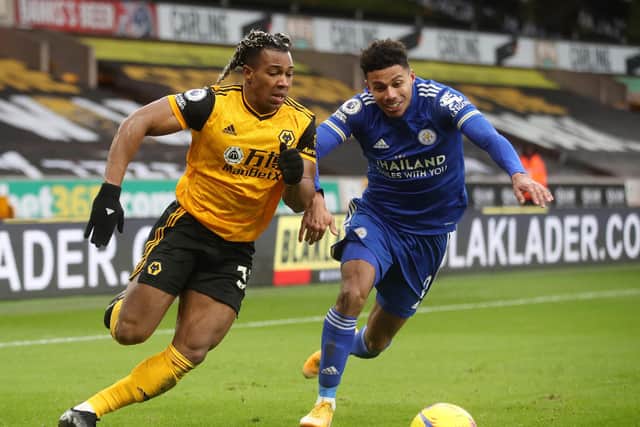 Adama Traore is challenged by James Justin of Leicester City during the Premier League match between Wolverhampton Wanderers and Leicester City at Molineux on February 07, 2021 in Wolverhampton, England. (Photo by Carl Recine - Pool/Getty Images)