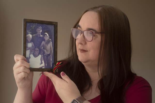 Louise Edwards, 49, whose father Jack died in 1985 as a resulted of blood infected with HIV, remembered her dad in this family photo of him with mum Margaret and brother David. Photo: Simon Hulme.