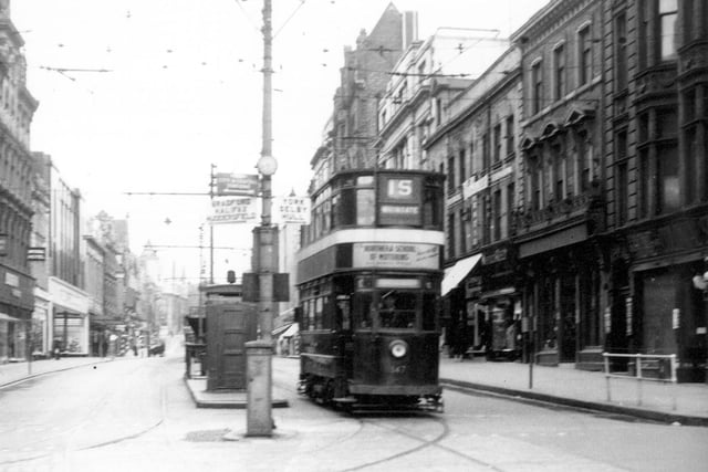 Tram No 147 travelling along Briggate on route 15 Whingate. Pictured in August 1954.