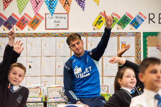 HANDS UP - Joe Rodon of Leeds United taking part in a PSHE lesson at Our Lady of Good Counsel Primary in Seacroft, Leeds. Pic: LUFC/Luke Holroyd