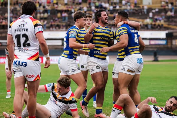 James Bentley, centre of picture, celebrates during Warrington Wolves' win at Bradford Bulls last week. Picture by Alex Whitehead/SWpix.com.