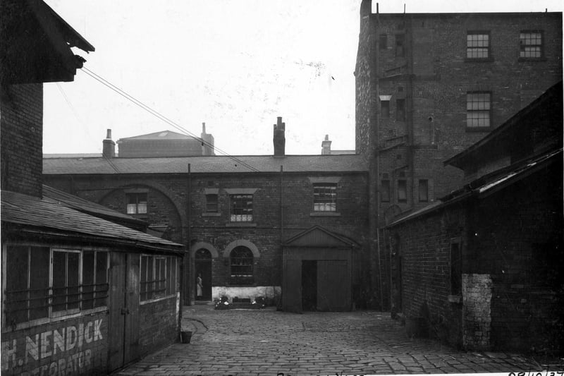 Located at the junction of Woodhouse Lane and Merrion Street, former Albion Brewery premises. It had opened in 1897 and closed in 1933. The buildings were demolished in 1939 and the site is now part of The Merrion Centre.