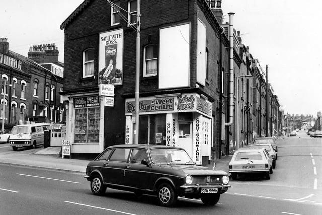 Bobby Superstore on Roundhay Road in April 1980. Next door is Bobby Sweet Centre and Kebab House offering ice cream, cold drinks, savoury snacks, curry and sandwiches. Homes in Bayswater Terrace can be seen left and Bayswater Row is on the right.