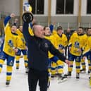 LEADING MAN: Head coach Ryan Aldridge holds the NIHL National league trophy aloft at Elland Road Ice Arena on Sunday night as his Leeds Knights' players watch on, having won the crown for the second year running. Picture: Jacob Lowe/Knights Media.