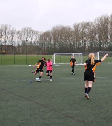 Leeds school Cardinal Heenan Catholic High's Year 7 girls football team find success in their first season.