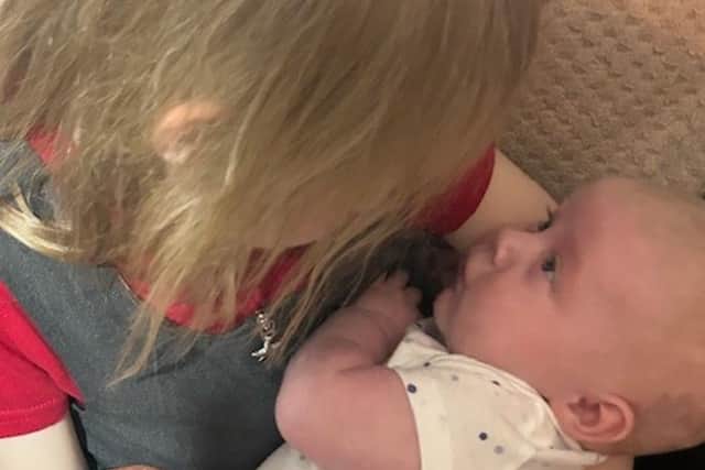 Ava is a doting big sister to Oscar.
