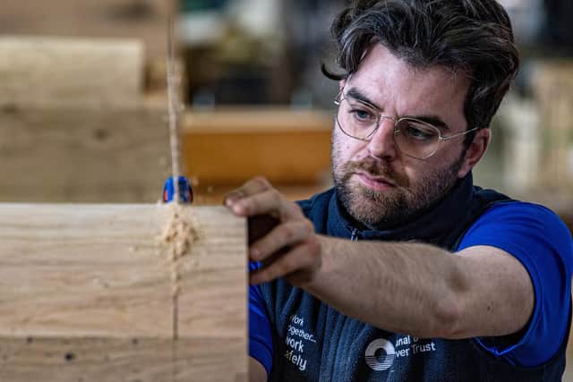 Luke Wrzosek working at the Canal & River Trust's Stanley Ferry workshop near Wakefield, making the unique lock gates which are designed and constructed on site.