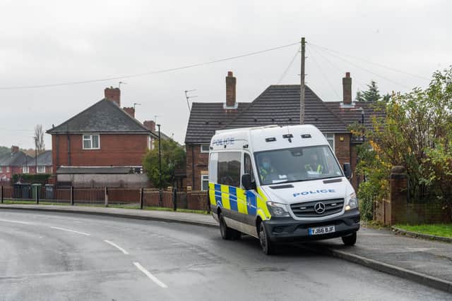 Stock image of police in Halton Moor, Leeds, where three people have been detained after air weapons were fired around the neighbourhood (Photo by James Hardisty/National World)