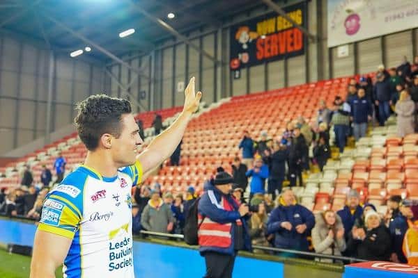 Leeds Rhinos stand-off Brodie Croft salutes the travelling fans after the win at Leigh Leopards. Picture by Olly Hassell/SWpix.com.