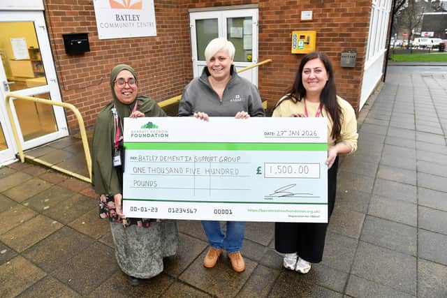 B&DWYW - 27.01.2026-002 - Nicola from Barratt and David Wilson Homes presenting a cheque to Batley Dementia Group