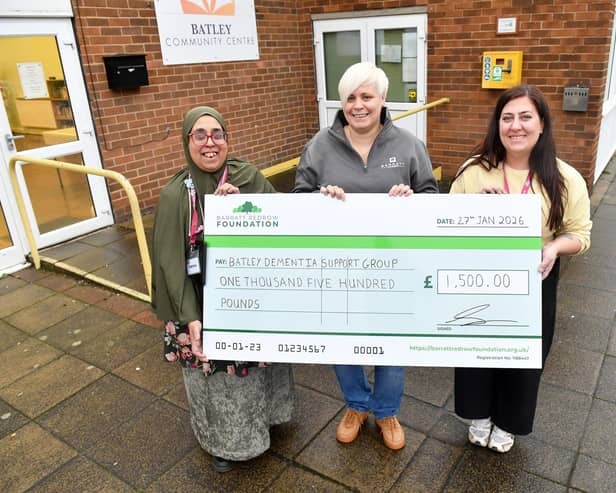 B&DWYW - 27.01.2026-002 - Nicola from Barratt and David Wilson Homes presenting a cheque to Batley Dementia Group
