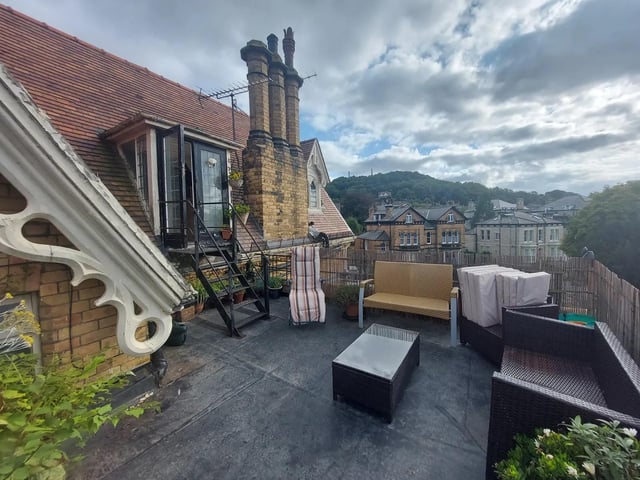 This penthouse has a roof terrace with views stretching to Oliver's Mount, and there is a communal garden.
