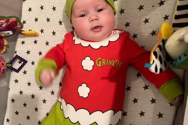 11 week old Penelope in a Grinch costume. Submitted by Kate Cliff.