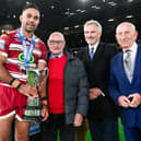 Bevan French receives the Rob Burrow Award from the Leeds Rhinos icon's father Geoff Burrow. Picture by Allan McKenzie/SWpix.com.