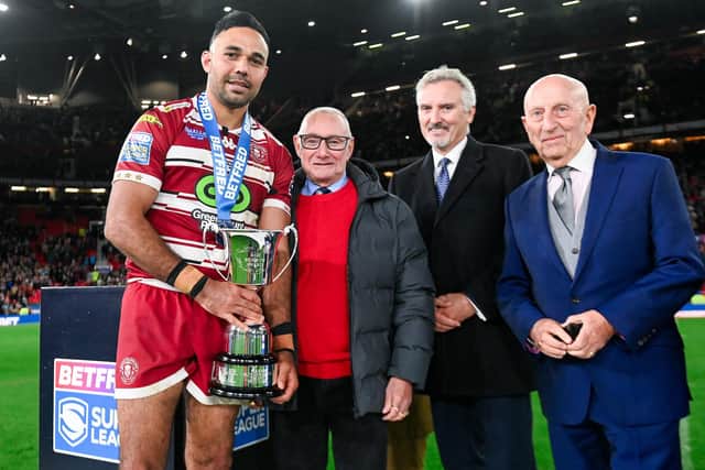 Bevan French receives the Rob Burrow Award from the Leeds Rhinos icon's father Geoff Burrow. Picture by Allan McKenzie/SWpix.com.