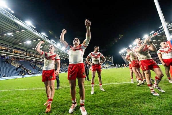 St Helens players, lewd by Matt Whitley and Sione Mata'utia, celebrate after last week's Super League win against Leeds Rhinos at Headingley. Picture by Allan McKenzie/SWpix.com.