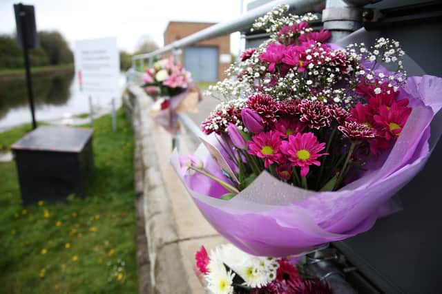 Flowers laid for schoolboy George Lund after he drowned in the Aire and Calder Navigation at Stourton. Picture: William Lailey/SWNS