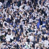 MORE THE MERRIER: Leeds United fans at Elland Road, above. Photo by Danny Lawson/PA Wire.