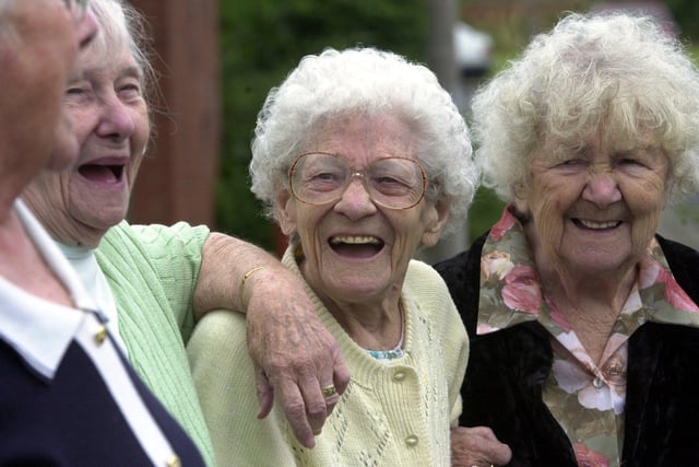 Alice Gardner (centre) enjoys a joke with her friends at the Richmond Hill Day Centre in July 2001. It was one of four at risk of closure under Leeds City Council proposals, a plan which sparked a wave of protest throughout the community.