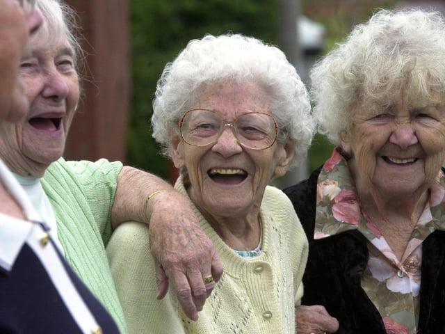 Alice Gardner (centre) enjoys a joke with her friends at the Richmond Hill Day Centre in July 2001. It was one of four at risk of closure under Leeds City Council proposals, a plan which sparked a wave of protest throughout the community.