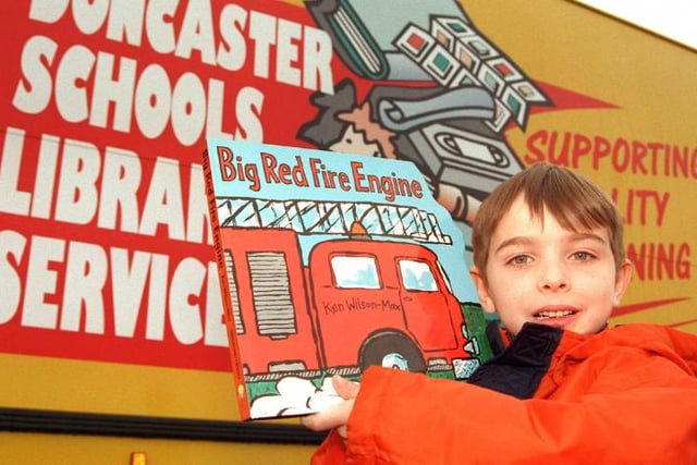 Who remebers the library bus? Here it is in 1999 with six year old Corey Johnson of Skellow.