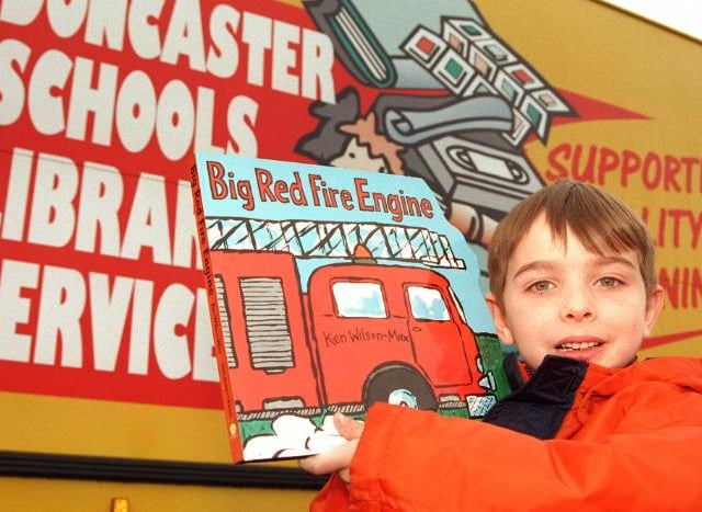 Who remebers the library bus? Here it is in 1999 with six year old Corey Johnson of Skellow.