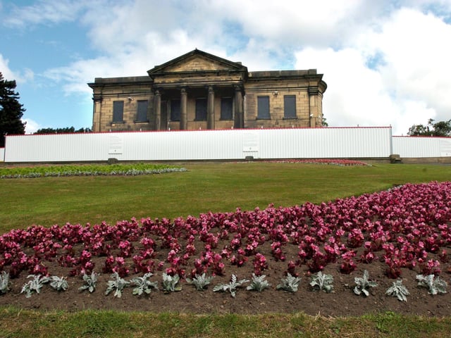 The Mansion House in Roundhay Park still behind hoardings in June 12004 as essential repair work continued on the building.