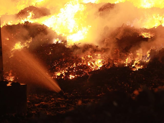 Metals and industrial waste have been burning all night.