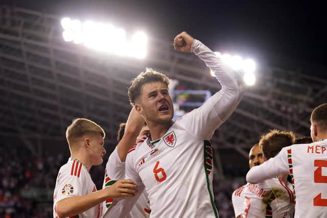 Wales' Joe Rodon celebrates after Nathan Broadhead scores their side's first goal of the game during the UEFA Euro 2024 Group D qualifying match at the Stadion Poljud, Split. Picture date: Saturday March 25, 2023.