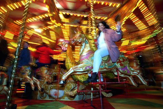Meena Jhakea from Moortown enjoys the merry go round at the Valentine's Fair in February 1996.