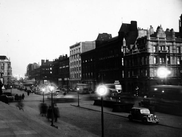 The Headrow at dusk in November 1948.