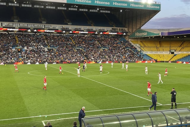 Leeds U21s are promoted after defeating Nottingham Forest 3-0 in the play-off final. Archie Gray bows his head and punches the air with both fists