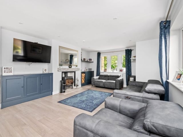 The dual aspect lounge with log burner.