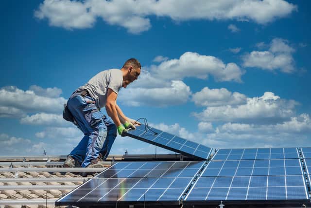 The scheme includes buying solar panels in bulk to save money.