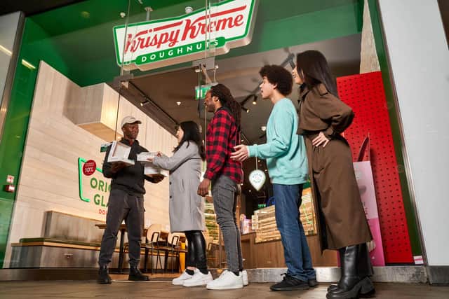 Krispy Kreme is giving away free boxes of fresh doughnuts in the final minute before closing (Photo: Simon Jacobs/PinPep)