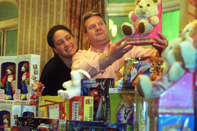 Leeds city centre's Three Legs pub, where karoke presenter Jackie is pictured with landlord Geoff Rose organising toys for Leeds hospitals.