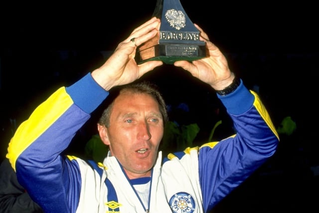 8 May 1990:  Leeds United manager Howard Wilkinson lifts the Division Two Championship trophy after victory in the match against Bournemouth at Dean Court in Bournemouth, England. \ Credit: Dan Smith /Allsport
