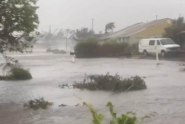 Hurricane Ian has left whole neighbourhoods in Florida underwater as it brought torrential rain and stormy weather to the state